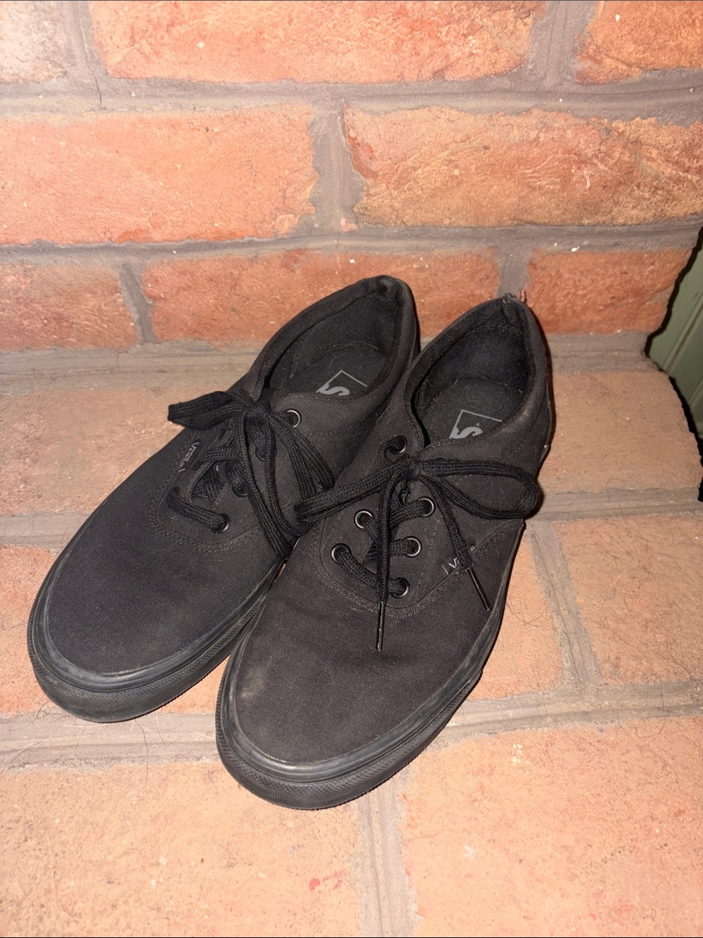 Vans Women’s All-Black Canvas Low-Top Sneakers